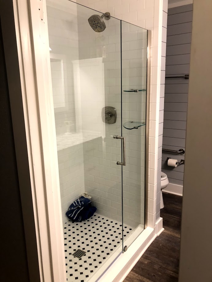 Two-piece frameless shower doors