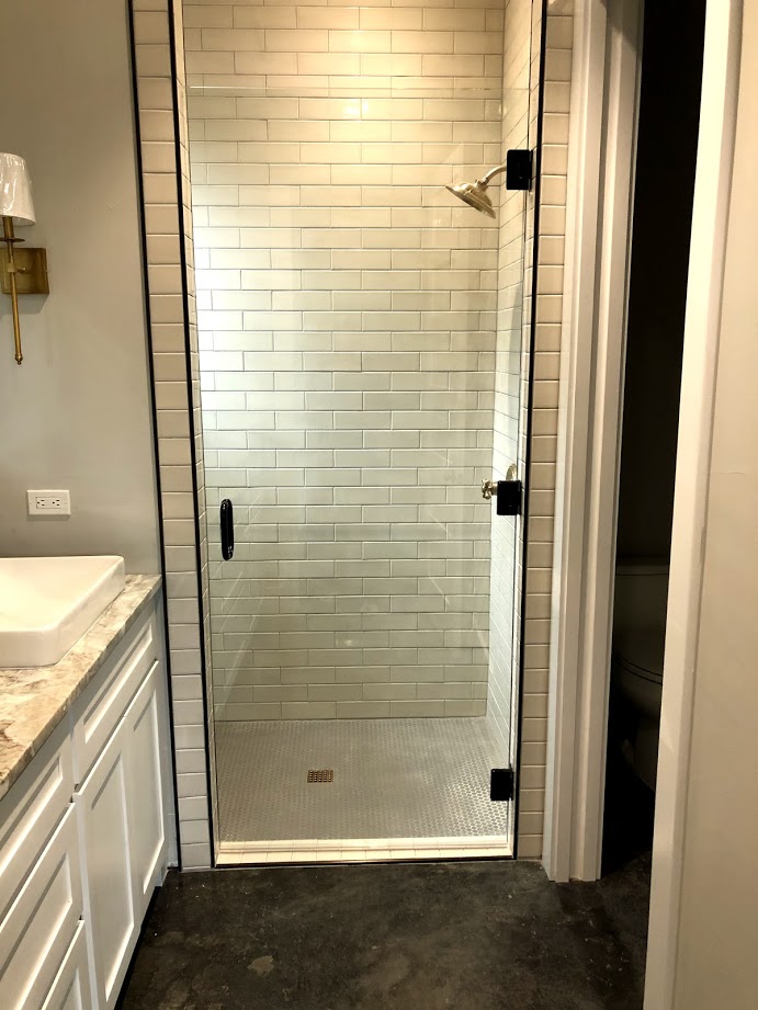 One-piece frameless shower doors