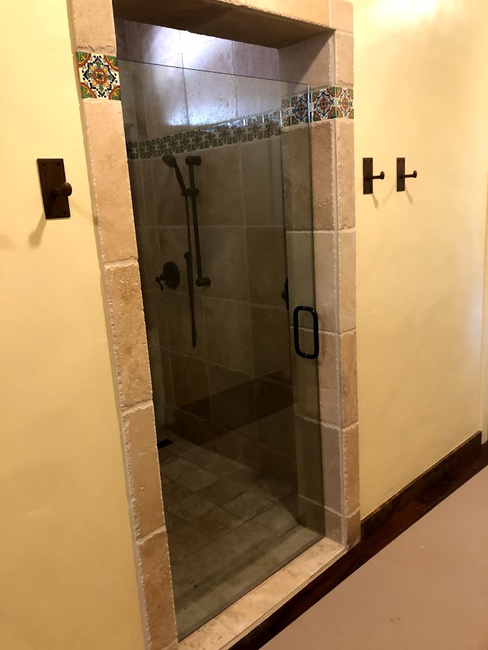 One-piece frameless shower doors