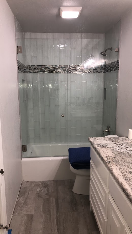 Two-piece frameless shower doors