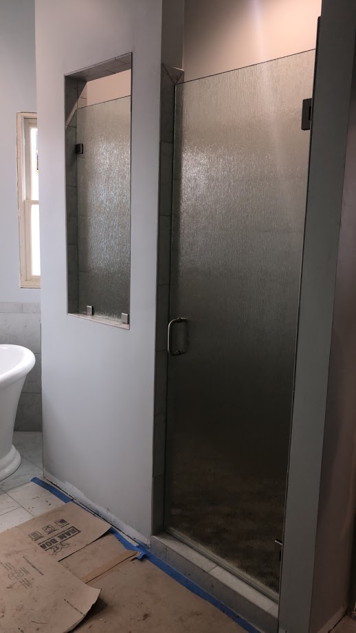 Two-piece frameless shower doors