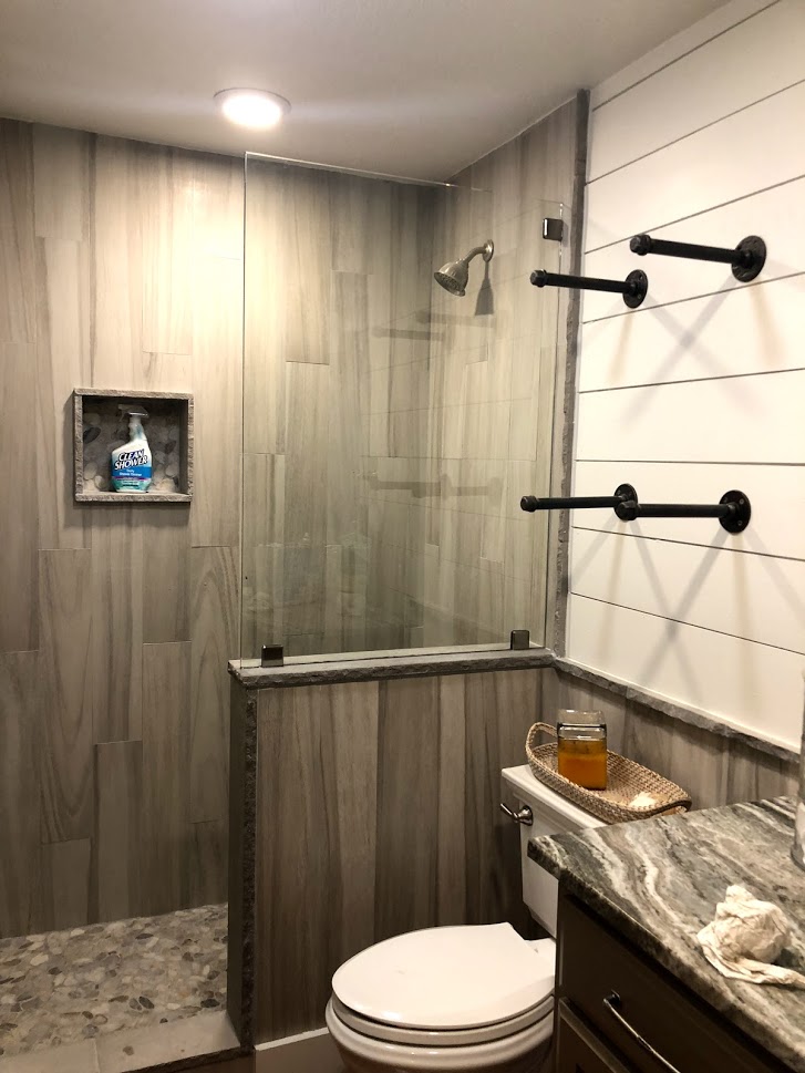 One-piece frameless shower doors