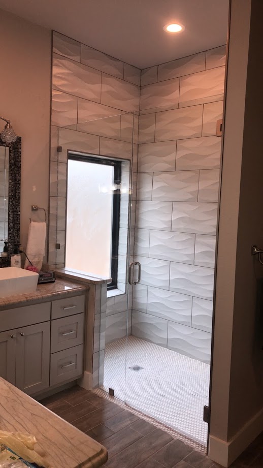 Two-piece frameless shower doors