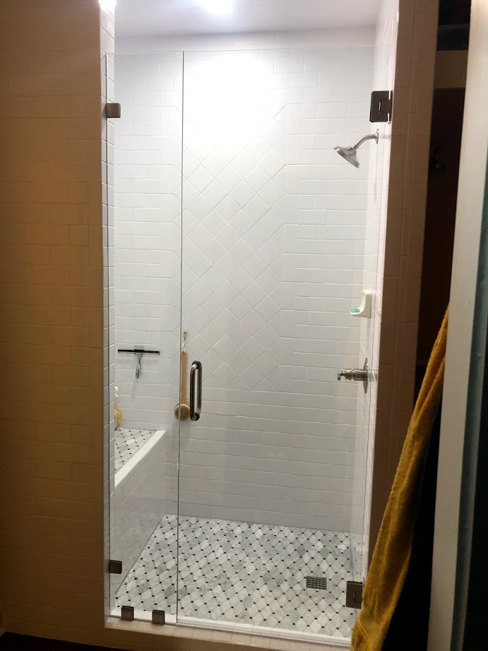 Two-piece frameless shower doors