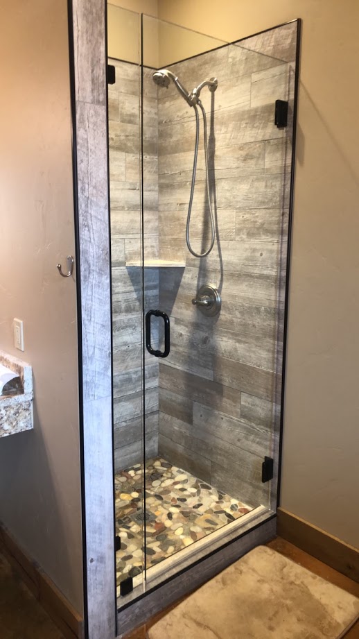 Two-piece frameless shower doors