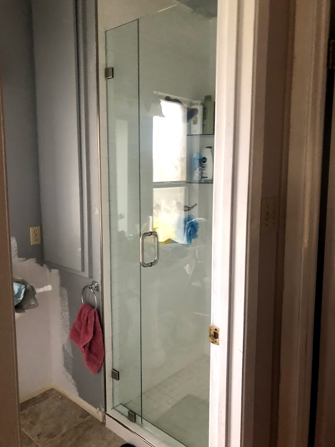 Two-piece frameless shower doors