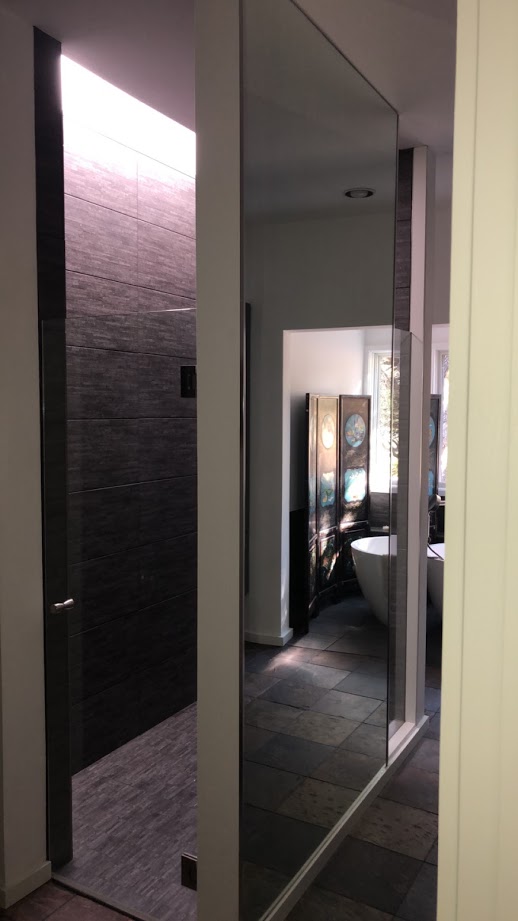 One-piece frameless shower doors